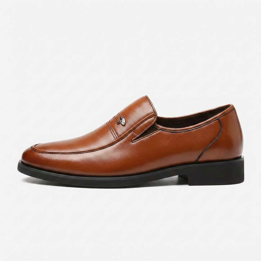 Brown men's leather slip-on business loafers by FJØRNA, side profile view showcasing sleek design and smooth leather finish.