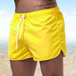Men's FJØRNA relaxed fit swim shorts with elastic waist and quick-dry fabric, perfect for beach and poolside comfort.