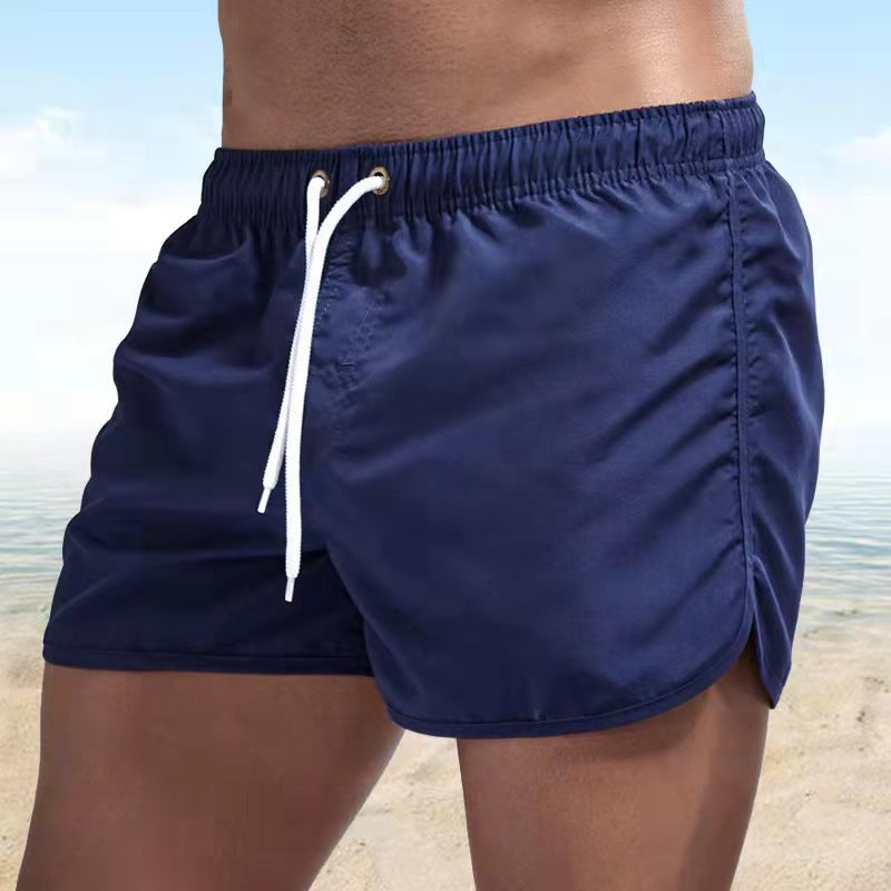 Men's relaxed fit quick-dry swim shorts with elastic waistband by FJØRNA, showcasing lightweight fabric and casual style.
