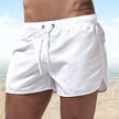 Men's relaxed fit quick-dry swim shorts with elastic waist by FJØRNA, featuring a lightweight, water-friendly design.