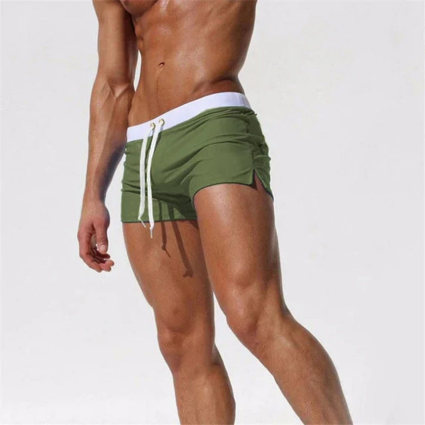 Men's FJØRNA swim boxers with adjustable waistband and side split, lightweight and comfortable for swim and beach activities.