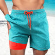 Men's FJØRNA swim shorts with multi-print designs and built-in compression liner for comfort and support.