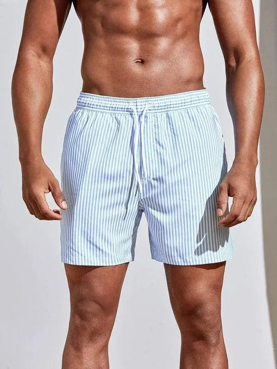 Men's FJØRNA pinstripe swim shorts with a drawstring waist, featuring a stylish striped pattern and comfortable fit.