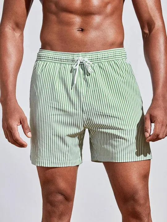 Men's pinstripe swim shorts with drawstring waist by FJØRNA, featuring a stylish pattern and comfortable fit for swimming or beach wear.