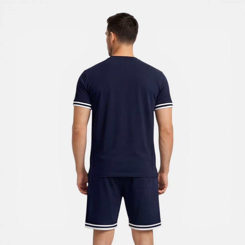 Men's summer set with breathable casual shorts and matching shirt by FJØRNA, perfect for comfortable, relaxed summer wear.