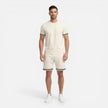 Men's breathable summer casual shorts outfit by FJØRNA, featuring a relaxed fit and comfortable fabric for warm weather wear.