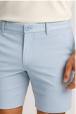 Light blue FJØRNA men's Bermuda shorts, casual knee-length pants with a relaxed fit, suitable for warm weather.