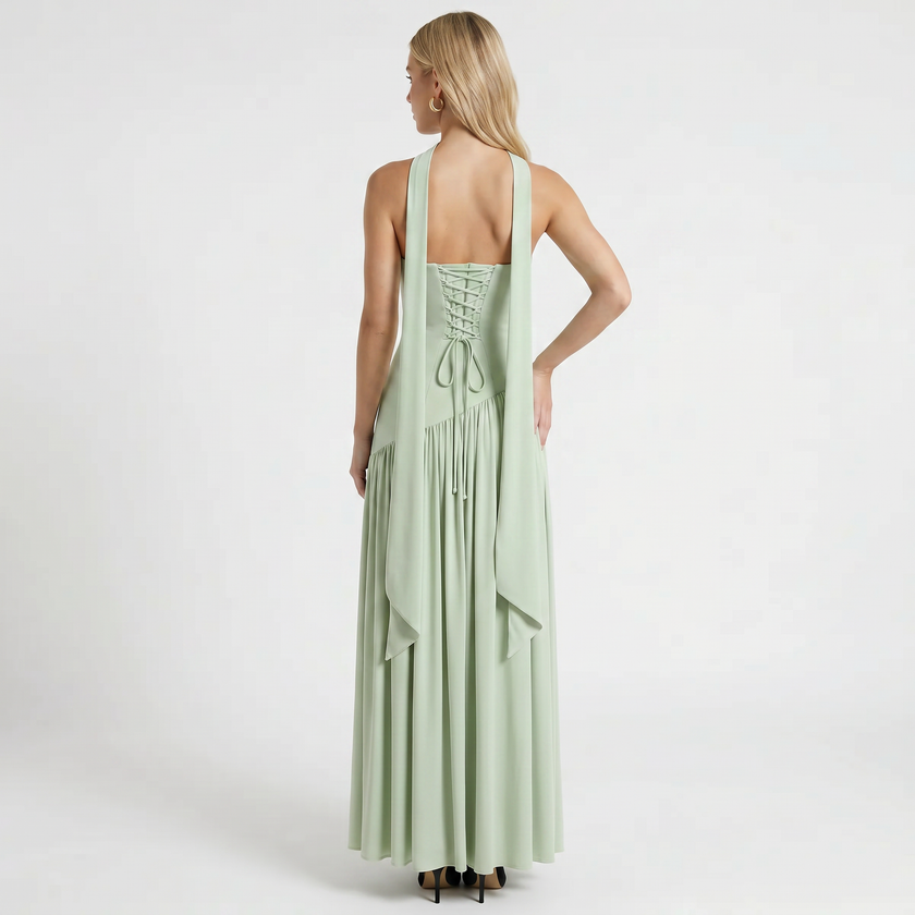 Mint green women's strapless maxi dress by FJØRNA, back view showing flowing fabric and elegant design for formal occasions.