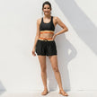 FJØRNA summer two-piece women's co-ord set with pockets, featuring a stylish matching top and pants, worn by a model.
