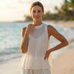 Model wearing FJØRNA flowing semi-sheer two-piece set with draped wide-leg trousers, showcasing elegant, lightweight fabric and relaxed fit.