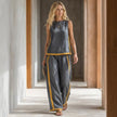 FJØRNA women's summer two-piece slit co-ord set worn by a model, featuring a stylish matching top and wide-leg pants.