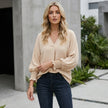 FJØRNA women's summer blouse with v-neck, denim fabric, ruffle details, lightweight top styled on a model