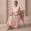 FJØRNA women’s summer two-piece pleated co-ord set worn by a model, featuring a stylish matching top and skirt ensemble.