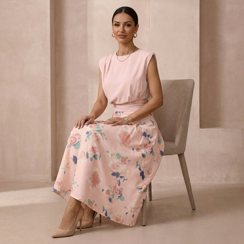 FJØRNA women’s summer two-piece pleated co-ord set worn by a model, featuring a stylish matching top and skirt ensemble.
