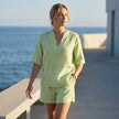 FJØRNA women's summer two-piece set with pockets and V-neck, stylish co-ord outfit worn by model in a casual setting.