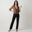 FJØRNA women's summer V-neck long sleeve denim blouse worn by a model, stylish and casual top for warm weather.