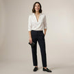 FJØRNA women's summer satin blouse with V-neck, long sleeves, and high waist, worn by a model showcasing elegant women's tops.
