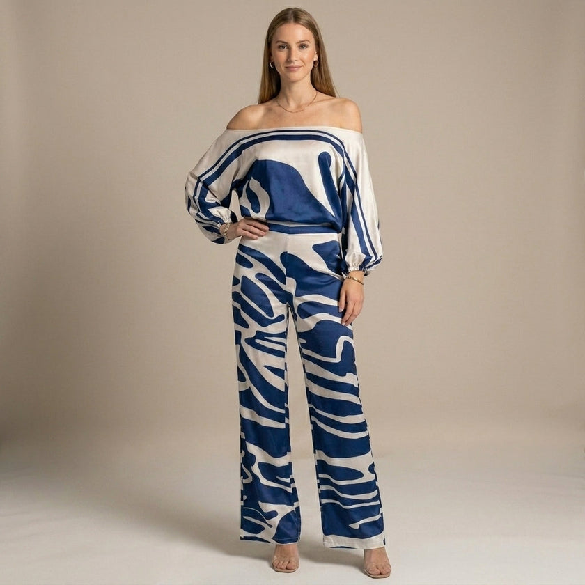 FJØRNA women's two-piece print wide-leg co-ord set modeled on a woman, featuring a stylish matching top and wide-leg pants.