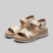 FJØRNA orthopedic platform strap sandals with buckle detail, featuring supportive design and casual style, worn by a model.