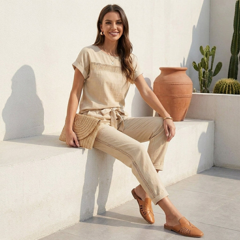FJØRNA women's two-piece co-ord set with mesh pockets, featuring a stylish top and matching pants on a model.