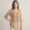 FJØRNA floral V-neck summer blouse for women, lightweight and stylish with a colorful floral pattern, worn by a model.