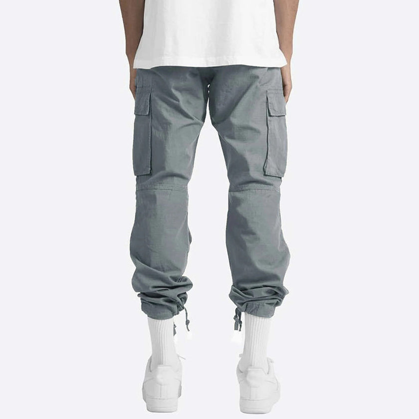 FJØRNA men's multifunctional cargo pants with multiple pockets, durable fabric, and practical design for outdoor and everyday wear.