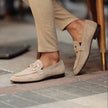 Men's beige suede loafers with horsebit detail and almond toe from FJØRNA, featuring a classic slip-on design.