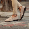 Men's beige suede loafers with almond toe and horsebit detail by FJØRNA, featuring a classic slip-on design.
