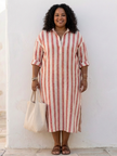 FJØRNA women's summer midi dress with long sleeves and blue and white striped pattern, casual and breezy for warm weather.