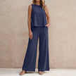 Navy blue FJØRNA sunlit sleeveless two-piece set with flowing wide-leg pants, casual and stylish for warm weather.
