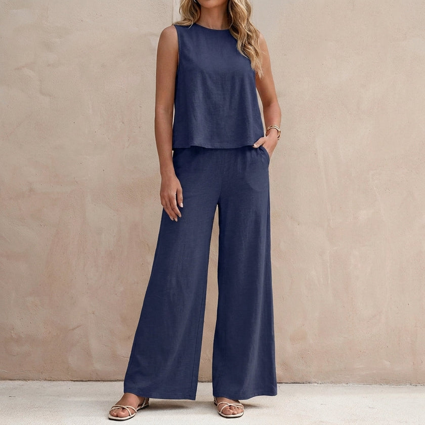Navy blue FJØRNA sunlit sleeveless two-piece set with flowing wide-leg pants, casual and stylish for warm weather.