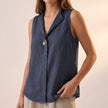 Navy blue sleeveless V-neck blouse for women with statement button details, stylish top from FJØRNA.