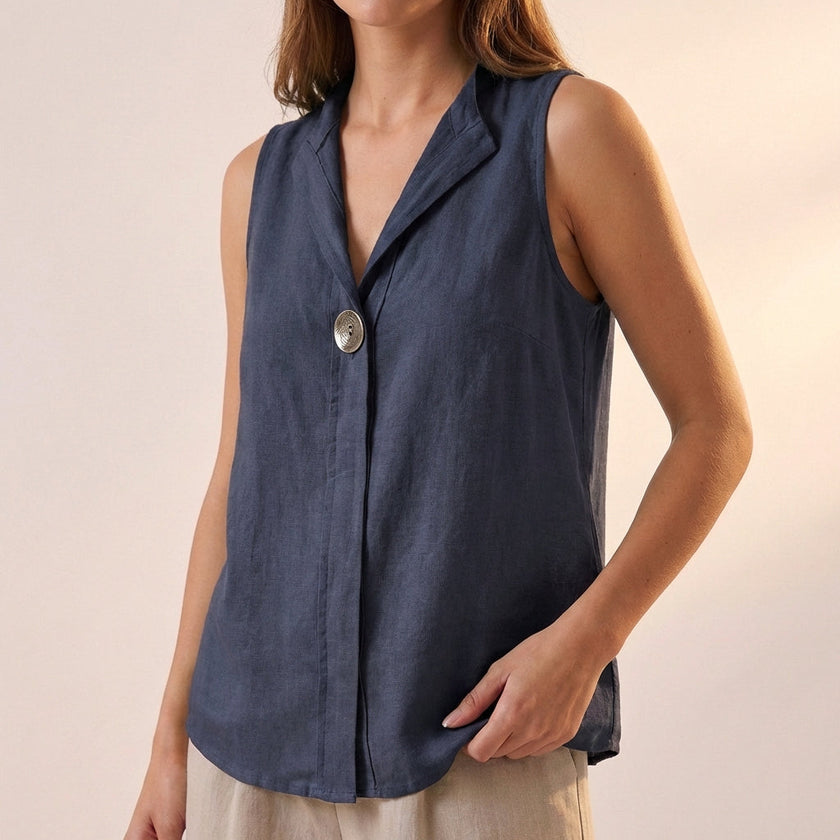 Navy blue sleeveless V-neck blouse for women with statement button details, stylish top from FJØRNA.