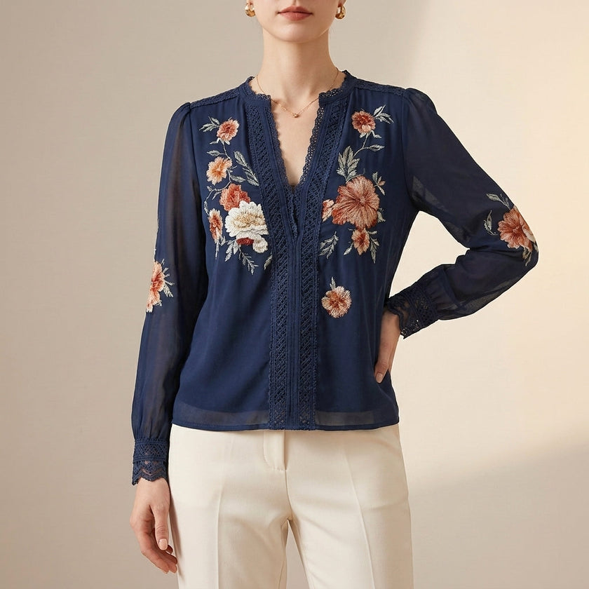 Navy blue floral V-neck long sleeve summer blouse for women by FJØRNA, featuring a stylish, lightweight top with a feminine design.