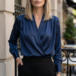 Navy blue women's summer blouse with V-neck and long satin sleeves, casual style from FJØRNA.