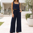 Navy linen blend cropped top and wide-leg pant set by FJØRNA, styled for a relaxed, elegant look.