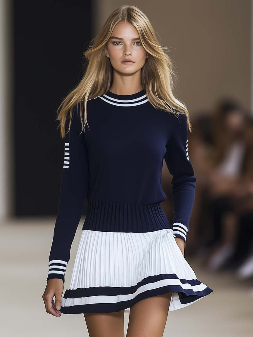 Navy blue mini dress for women by FJØRNA, featuring a fitted silhouette and sleeveless design, ideal for casual or semi-formal occasions.