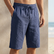 Navy blue men's casual knee-length chino shorts with adjustable drawstring waist, ideal for vacation wear by FJØRNA.