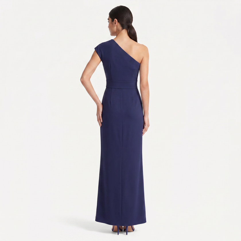 Navy women's one-shoulder maxi evening dress by FJØRNA with asymmetric neckline, back profile view, elegant and flowing style.