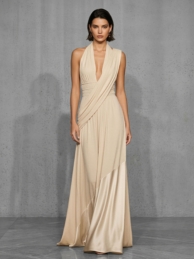 FJØRNA nude satin evening dress featuring a sleek, elegant design, smooth fabric, and flattering fit for formal occasions.