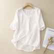 FJØRNA women's summer V-neck short sleeve linen blouse, light and breathable top for warm weather, in natural fabric and style.