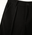 Women’s wool tapered trousers by FJØRNA, featuring a tailored fit, soft fabric, and classic design for versatile style.