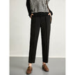 FJØRNA women's tapered wool trousers, stylish and comfortable pants with a tailored fit, shown in a neutral fabric.