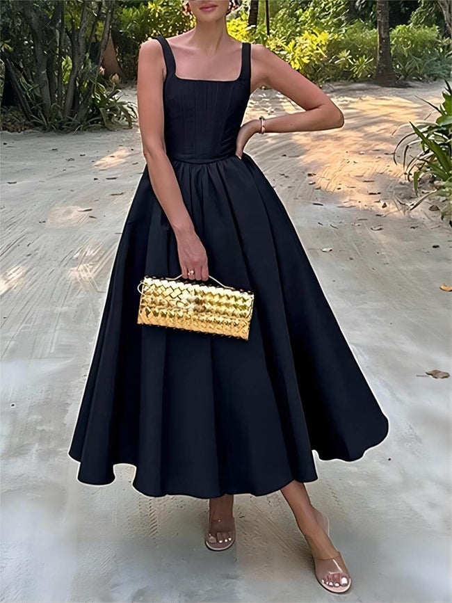 FJØRNA off-shoulder strapless sleeveless women's maxi dress with flowing fabric and elegant design, perfect for formal occasions.