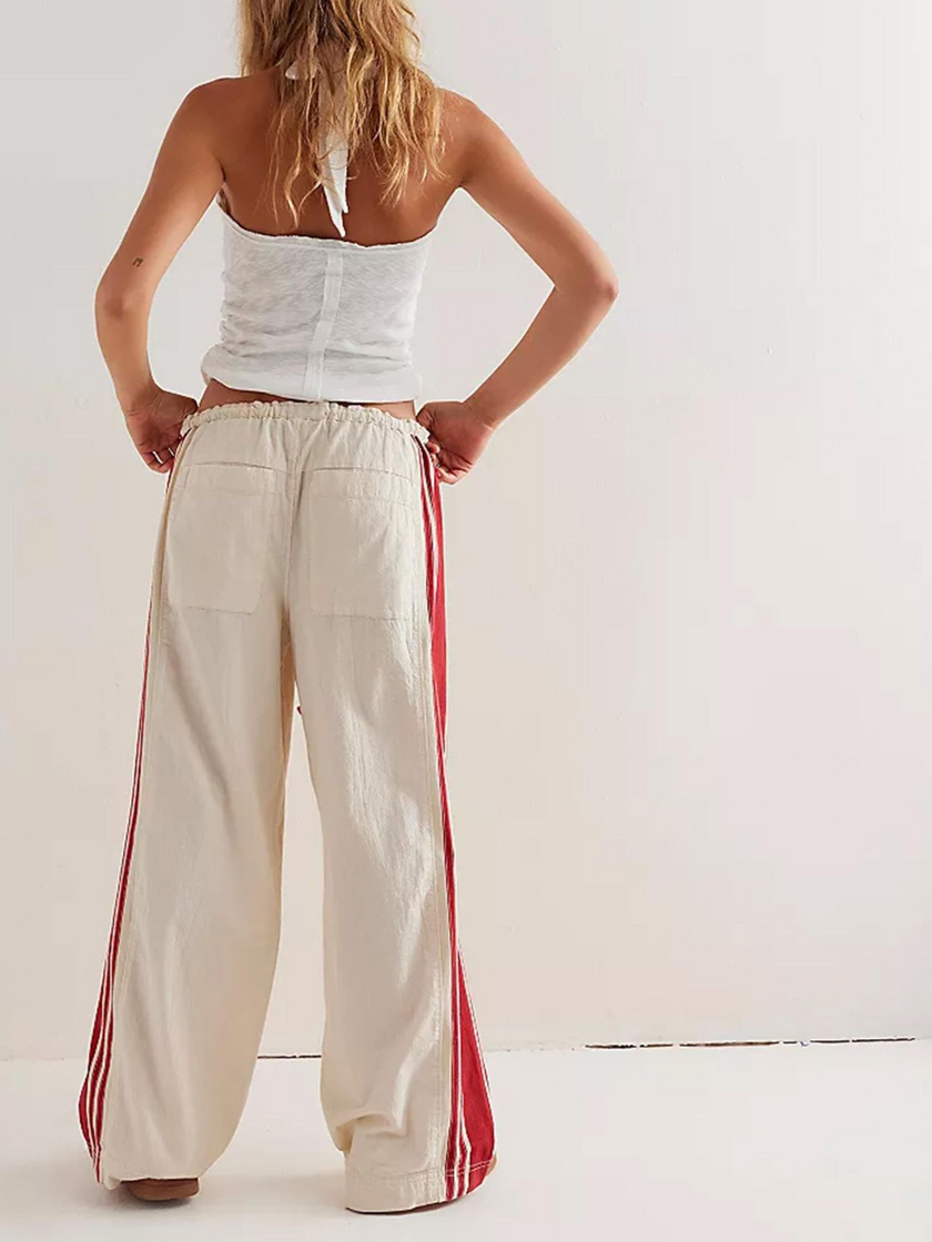Women’s high waist cotton joggers by FJØRNA featuring elastic waistband and relaxed fit, casual pants perfect for everyday wear.