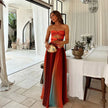 FJØRNA women's elegant maxi dress with geometric strapless design, flowing fabric and stylish silhouette for formal occasions.