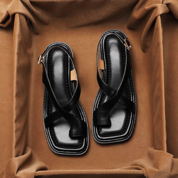 FJØRNA women's Italian leather sandals with adjustable straps and cross design, showcasing stylish summer footwear.