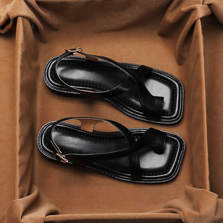 FJØRNA women's Italian leather sandals with adjustable straps, open-toe design, and cross strap detail on a neutral background.