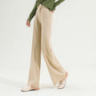 FJØRNA women's wide-leg merino wool trousers with high waist, showcasing a soft, stylish fit and tailored design.