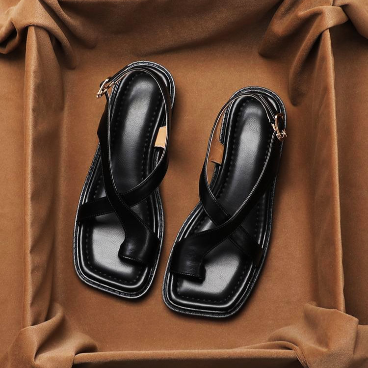 FJØRNA women's Italian leather sandals with adjustable straps and cross design, showcasing stylish open-toe shoes.